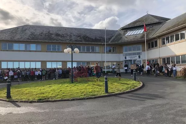 Protesters gather as council consults on plan to shut four Welsh-medium schools